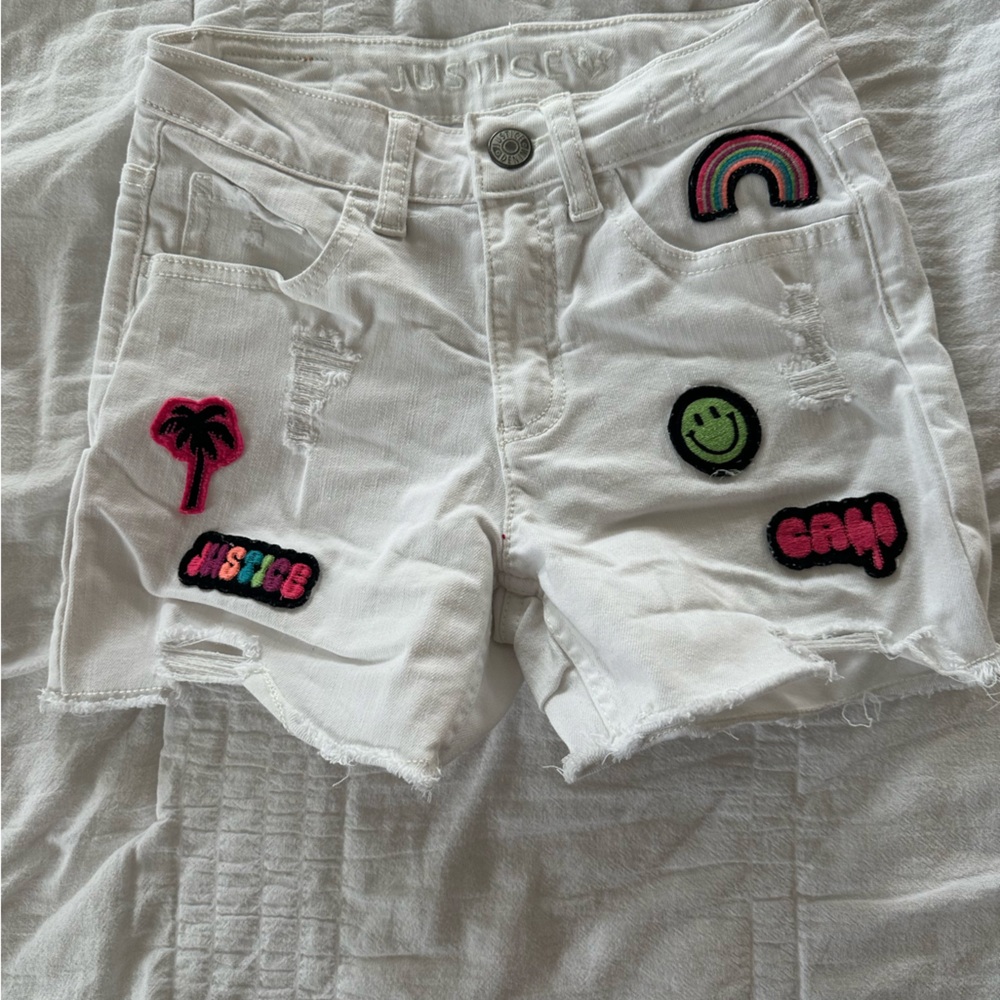 Justice white denim shorts. Girls size 10.